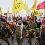 أمريكا توقف شحنات الدولار للعراق: ضغوط أمريكية لتفكيك الفصائل المسلحة